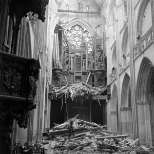 The Saint-Pierre church ruins: soldier amid fallen bell tower.