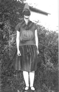 Girl in a Halloween costume, Ontario, Canada, 1928.