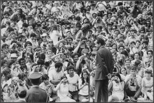 A crowd of young Americans try to photograph the President  22 July 1969