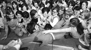 Jimmy Swarbrigg being mobbed by fans at the Television Club in Dublin, 1968.